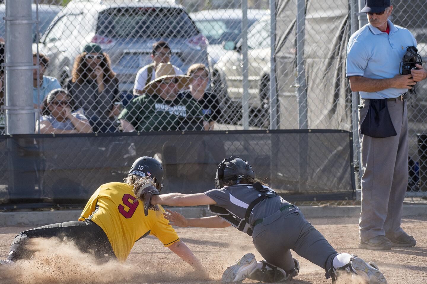 Etancia vs. Costa Mesa in a girls' softball game