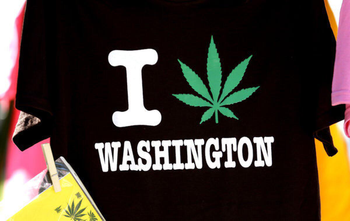 A T-shirt is displayed at the first day of Hempfest in Seattle this month. Thousands packed the city's waterfront park for the opening of a three-day marijuana festival that was part party, part protest and part victory celebration after the legalization of pot in Washington and Colorado last fall.