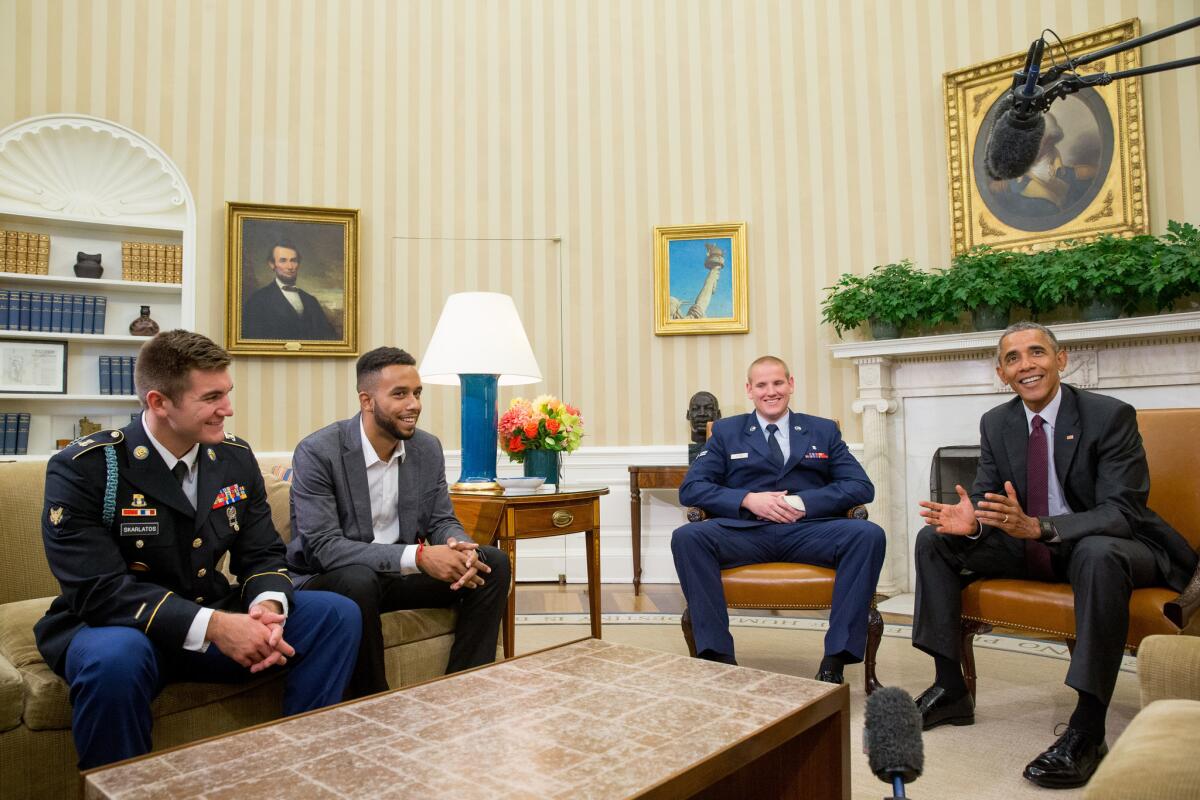 President Obama meets with Oregon National Guardsman Alek Skarlatos, left, Anthony Sadler and Air Force Airman 1st Class Spencer Stone in the Oval Office on Thursday.