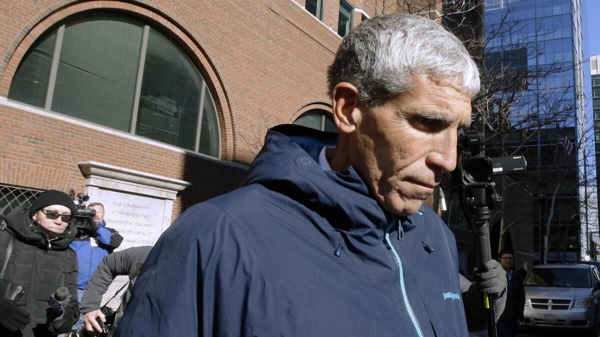 William "Rick" Singer departs federal court in Boston last month after he pleaded guilty to charges in a nationwide college admissions bribery scandal.