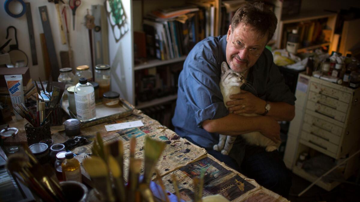 Painter Tom Knechtel, who has a pair of shows on view in L.A., with his beloved cat Nino.