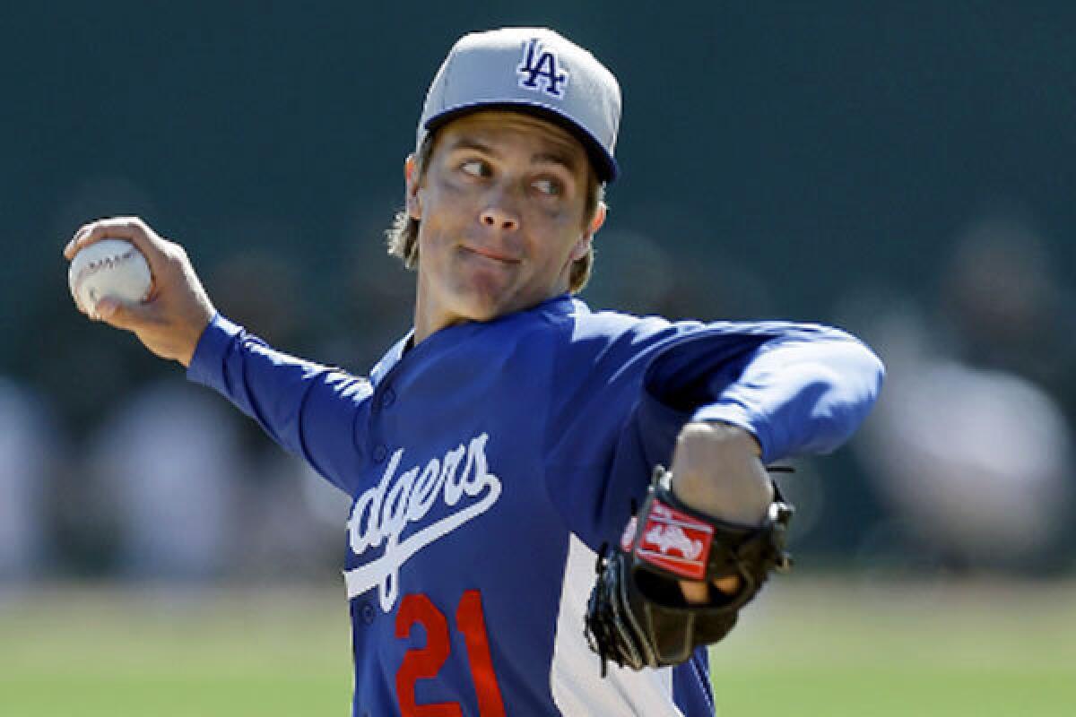 Right-hander Zack Greinke, the Dodgers' $147-million man, left spring training and headed to Los Angeles to have his tender elbow examined by Dr. Neal ElAttrache.