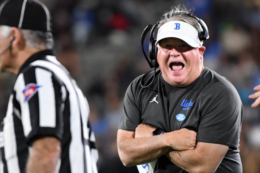 Pasadena, California November 13, 2021: UCLA had coach Chip Kelly has a few words.