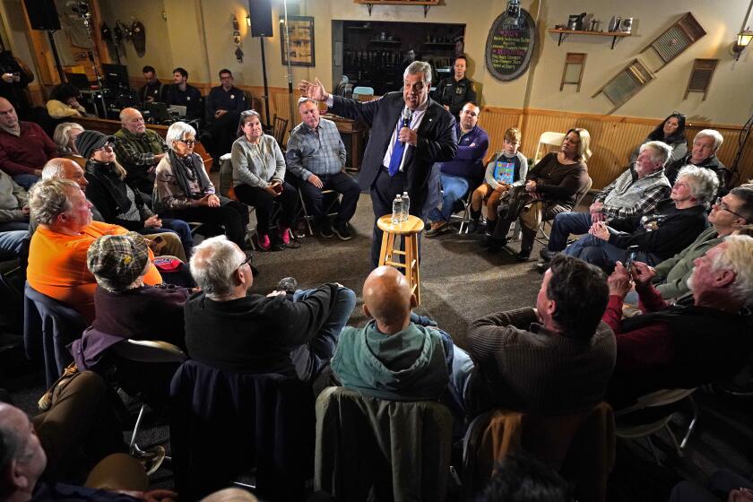 Republican presidential candidate former New Jersey Gov. Chris Christie speaks at a town hall campaign event at Mitchell Hill BBQ Grill and Brew, Tuesday, Jan. 9, 2024, in Rochester, N.H. (AP Photo/Robert F. Bukaty)