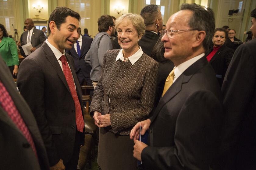 SACRAMENTO, CALIF. -- THURSDAY, JANUARY 21, 2016: Supreme Court of California Justice Mariano-Florentino Cuellar, left, Associate Justice Kathryn Werdegar, center, and Associate Justice Ming Chin, right, during a joint session of the California Legislature for Governor Brown's State of the State speech in Sacramento, Calif., on Jan. 21, 2016. (Brian van der Brug / Los Angeles Times)