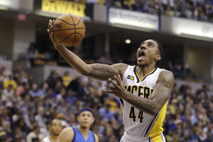Pacers point guard Jeff Teague puts up a shot during the second half of a game against the Dallas Mavericks on Oct. 26.