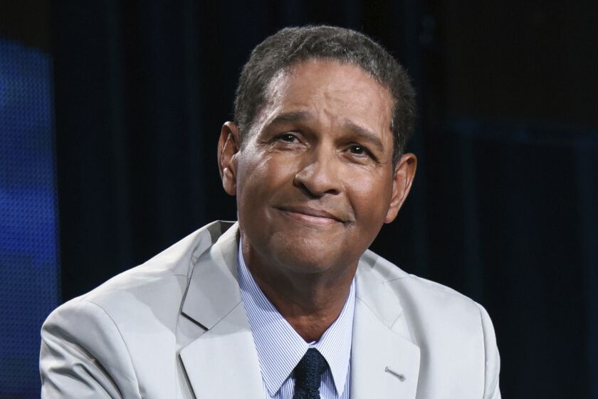 FILE - Sportscaster Bryant Gumbel speaks on stage at HBO 2015 Winter TCA in Pasadena, Calif., Jan. 8, 2015. Bryant Gumbel will receive the Lifetime Achievement Award during the 44th Sports Emmy Awards on May 22 in New York. The National Academy of Television Arts & Sciences made the announcement on Tuesday, March 28, 2023.(Photo by Richard Shotwell/Invision/AP, File)