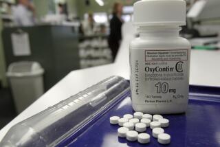 OxyContin pills are arranged for a photo at a pharmacy in Montpelier, Vt. on Tuesday, Feb. 19, 2013. Drug overdose deaths rose for the 11th straight year, federal data show, and most of them were accidents involving addictive painkillers despite growing attention to risks from these medicines. As in previous recent years, opioid drugs — which include OxyContin and Vicodin — were the biggest problem, contributing to 3 out of 4 medication overdose deaths. (AP Photo/Toby Talbot)