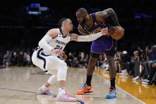 Memphis Grizzlies forward Dillon Brooks (24) defends against Los Angeles Lakers forward LeBron James.