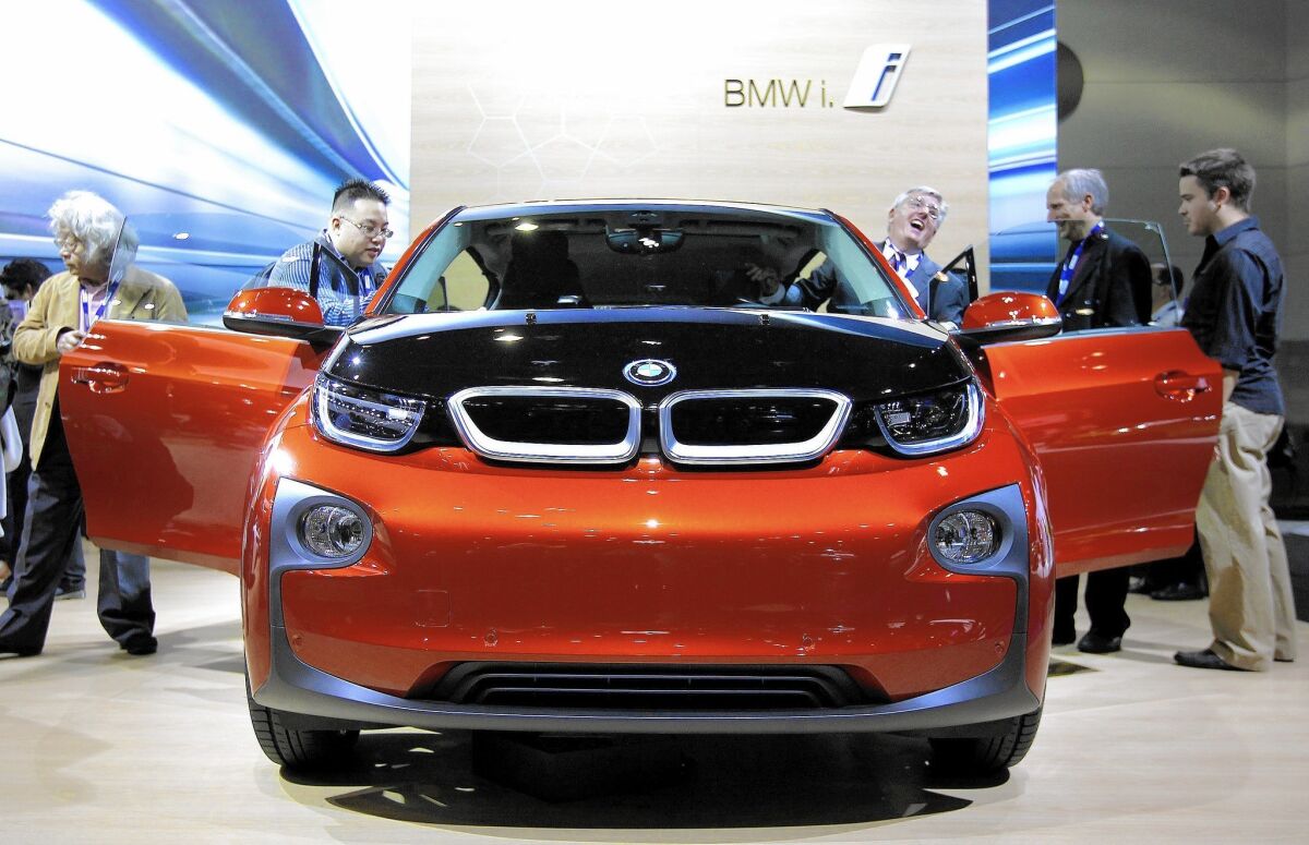 The BMW i3, a five-door, zero-emissions electric car, is displayed at the 2013 Los Angeles Auto Show at the Convention Center in downtown L.A.