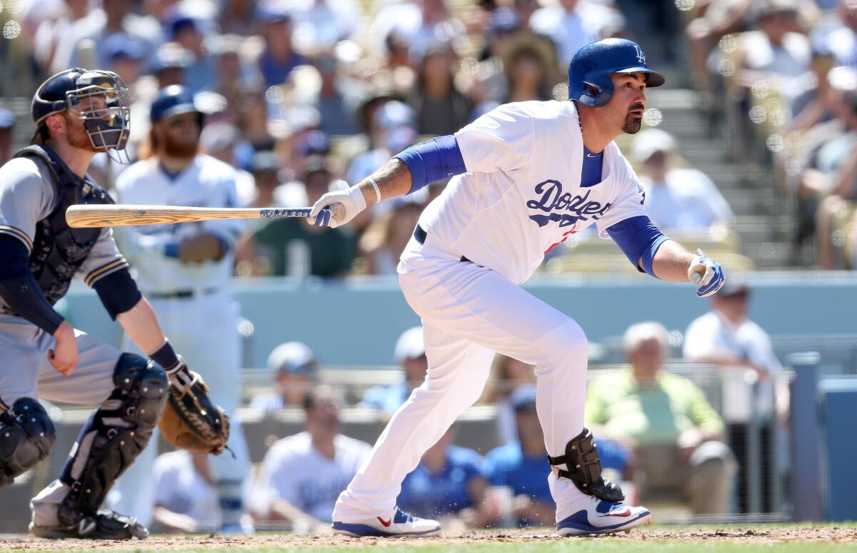 LOS ANGELES, CA - JULY 12: Adrian Gonzalez #23 of the Los Angeles Dodgers hits a two run home run in the eighth inning to give the Dodgers a 4-3 lead against the Milwaukee Brewers at Dodger Stadium on July 12, 2015 in Los Angeles, California. (Photo by Stephen Dunn/Getty Images) ** OUTS - ELSENT, FPG - OUTS * NM, PH, VA if sourced by CT, LA or MoD **