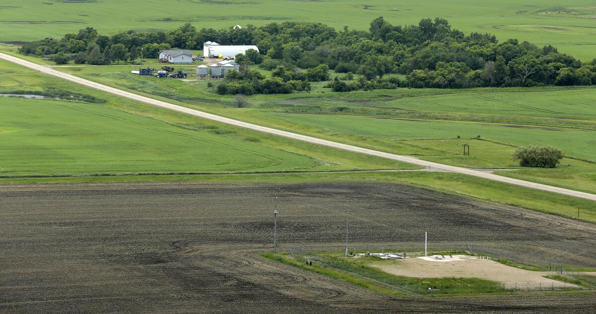 An ICBM launch site  among fields and farms in the countryside outside Minot, N.D.