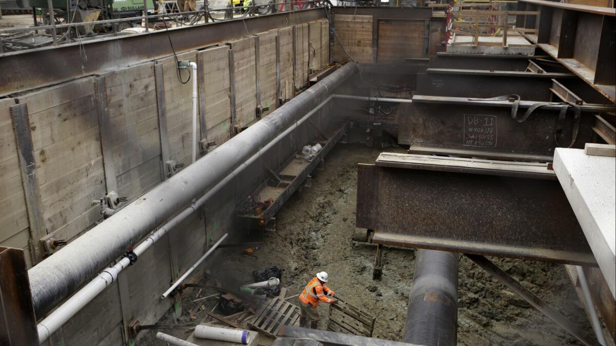 Work progresses on the Purple Line subway at La Brea and Wilshire Boulevard last year. On Thursday, Metro officials picked a contractor to dig the tunnels for the third phase of the project, which will run from Century City to West L.A.