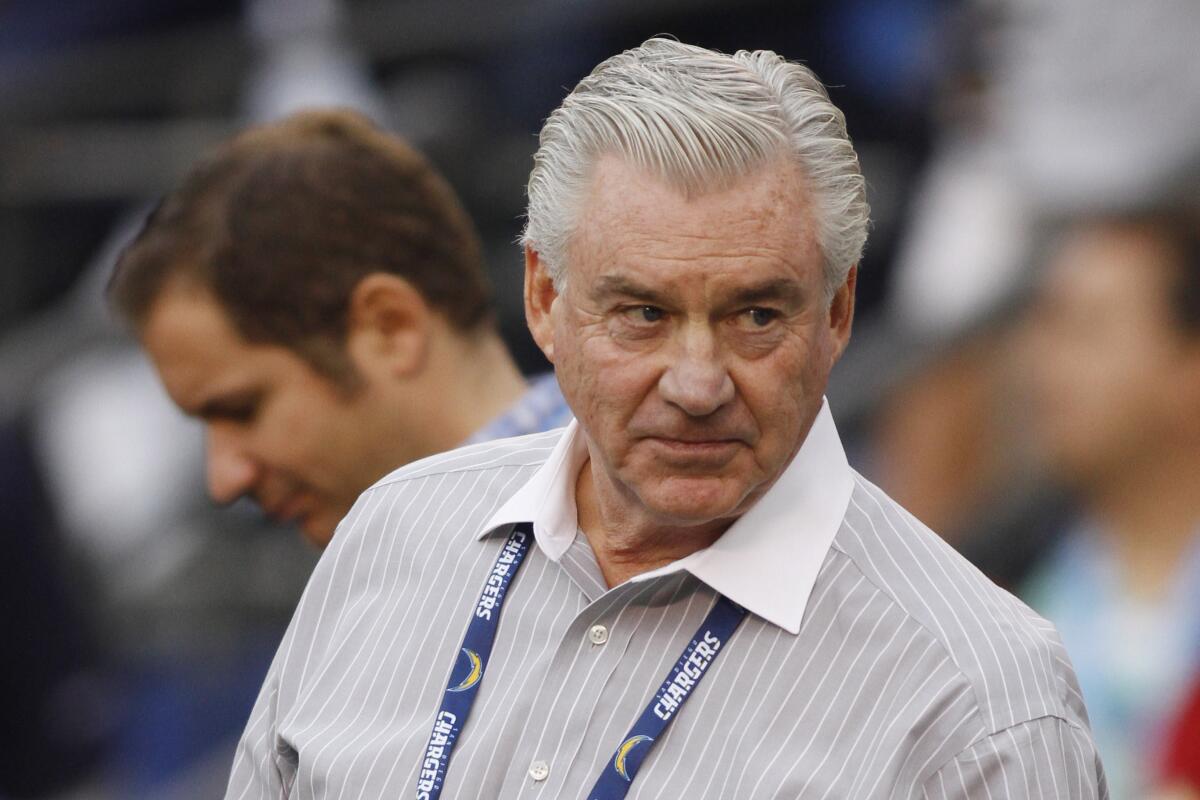 Chargers general manager A.J. Smith looks on from the sidelines during a 2010 game.