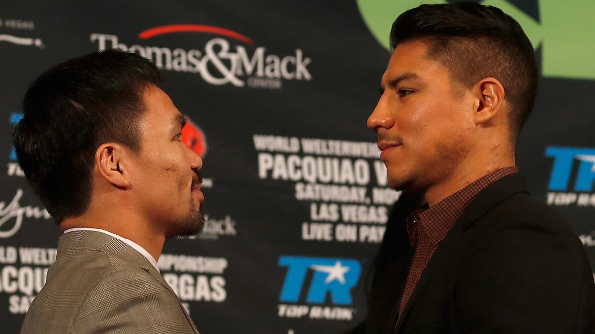 Manny Pacquiao, left, and Jessie Vargas face off during a Sept. 8 news conference in Beverly Hills.