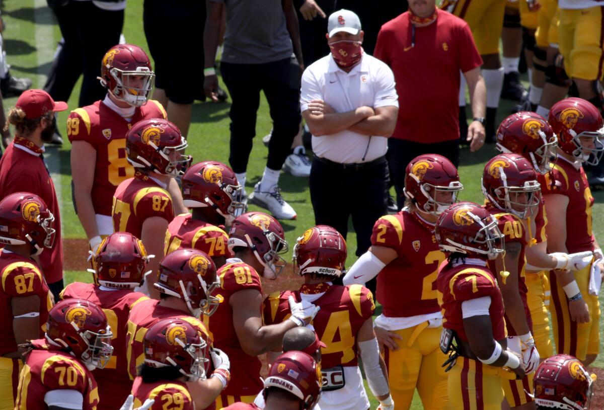 USC coach Clay Helton looks on at the Trojans' spring game at the Coliseum on April 17, 2021. 