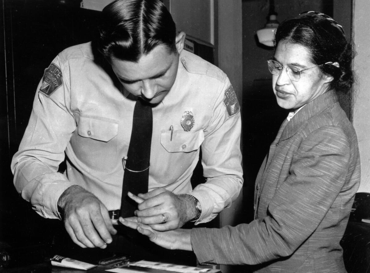 Rosa Parks is fingerprinted on Feb. 22, 1956, in Montgomery, Ala., when she and other civil rights leaders were charged with violating a state statute against boycotts.