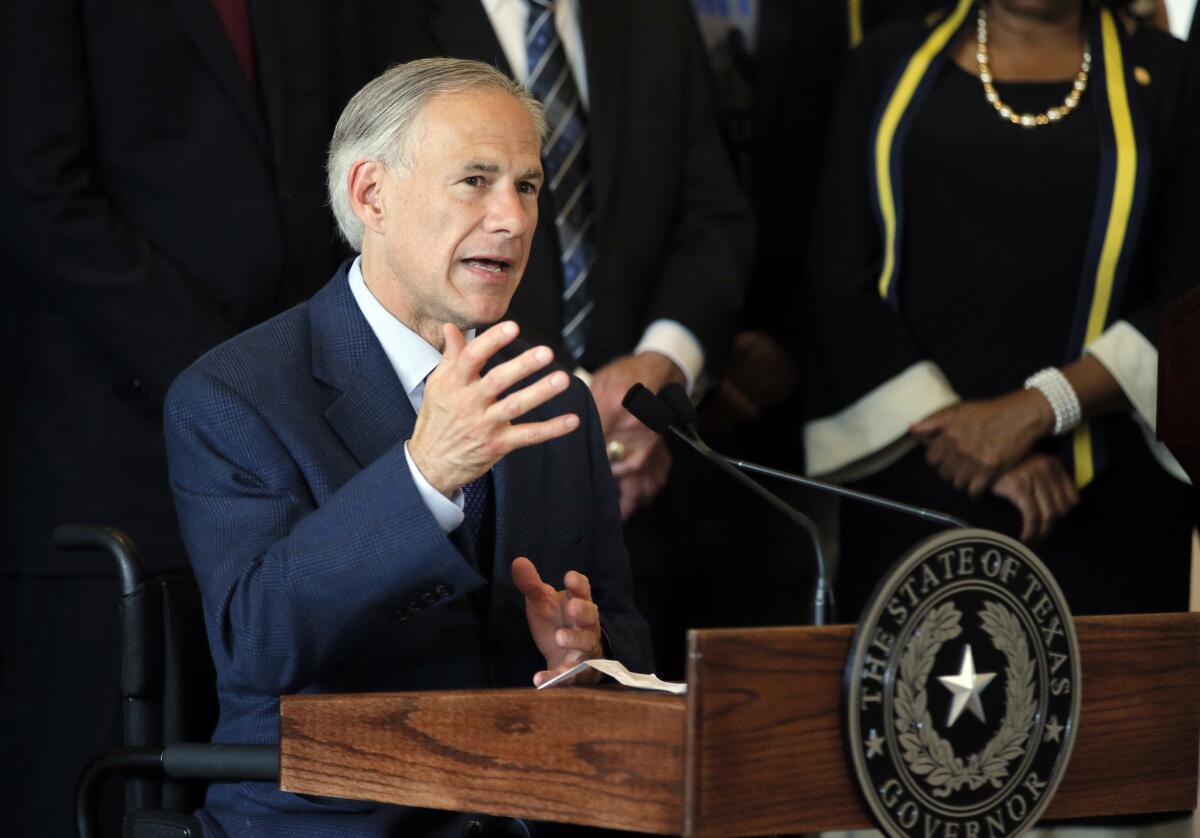 Texas Gov. Greg Abbott, shown at a news conference July 8 in Dallas, complained in a tweet that the Big 12 "punted on expansion."
