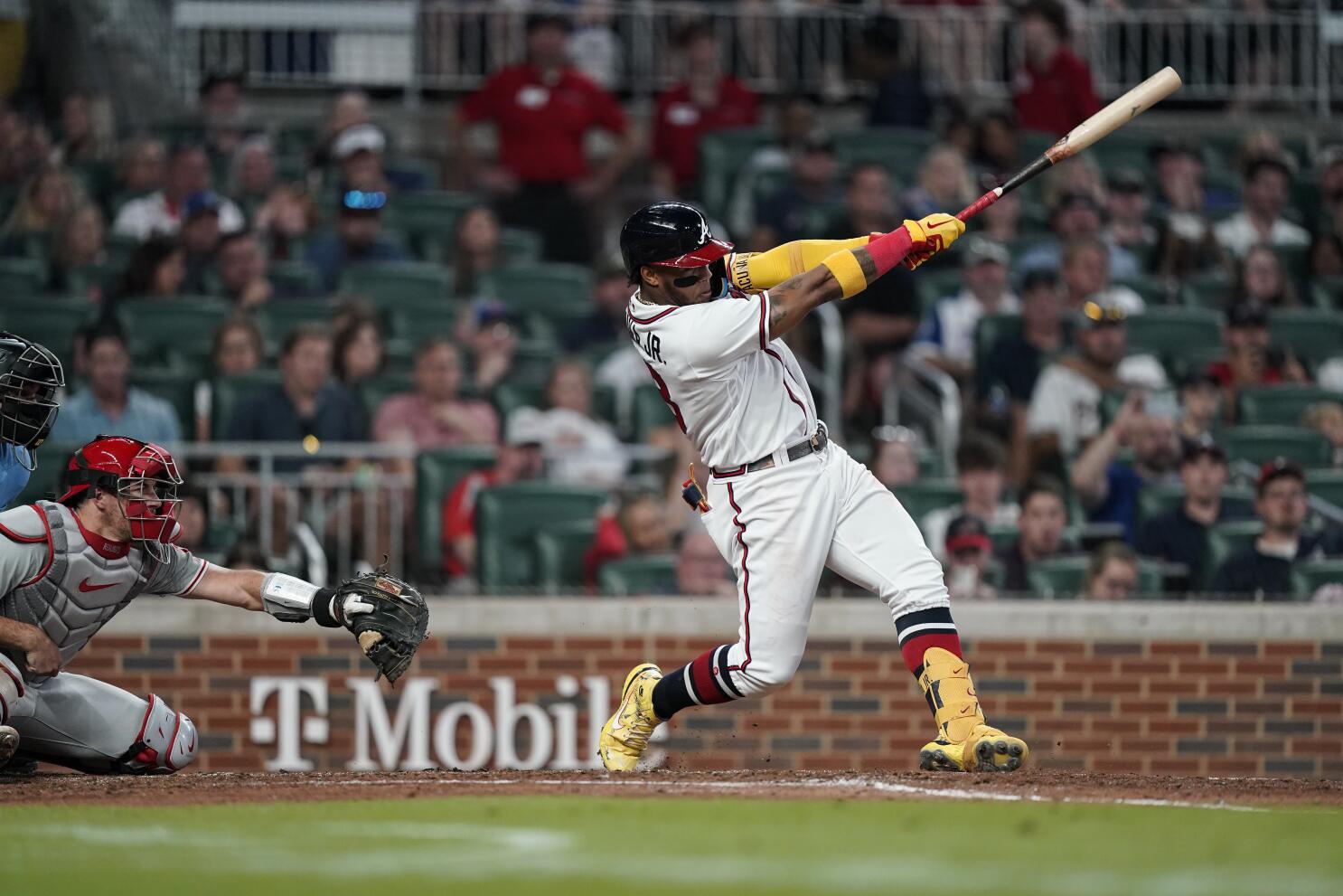 Multiple Fans Rush Field and Make Contact With Braves' Ronald