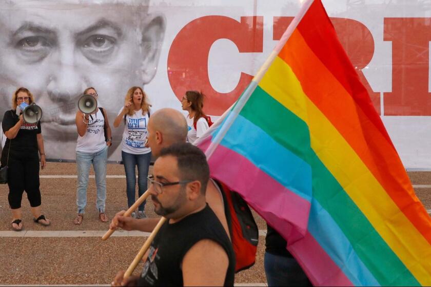 Participants attend a demonstration in Tel Aviv on July 22, 2018, to protest a new surrogacy law that does not include gay couples. The demonstration comes after parliament, earlier in the week, approved surrogacy for single women or those unable to bear children -- without granting the same right to same-sex couples or single men. / AFP PHOTO / JACK GUEZJACK GUEZ/AFP/Getty Images ** OUTS - ELSENT, FPG, CM - OUTS * NM, PH, VA if sourced by CT, LA or MoD **