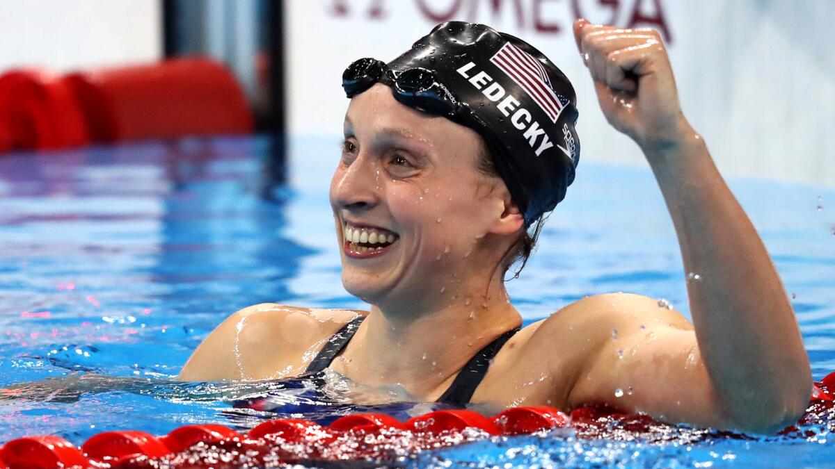 Katie Ledecky is all smiles after crushing the competition in winning the 800-meter freestyle final on Friday.