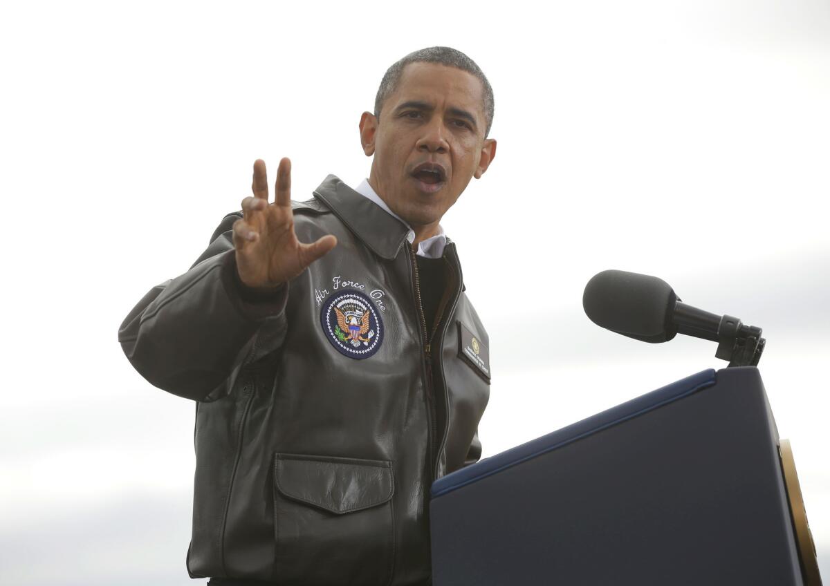 President Obama, in a bomber jacket to ward off the Wisconsin chill, campaigns in Green Bay, Wis.