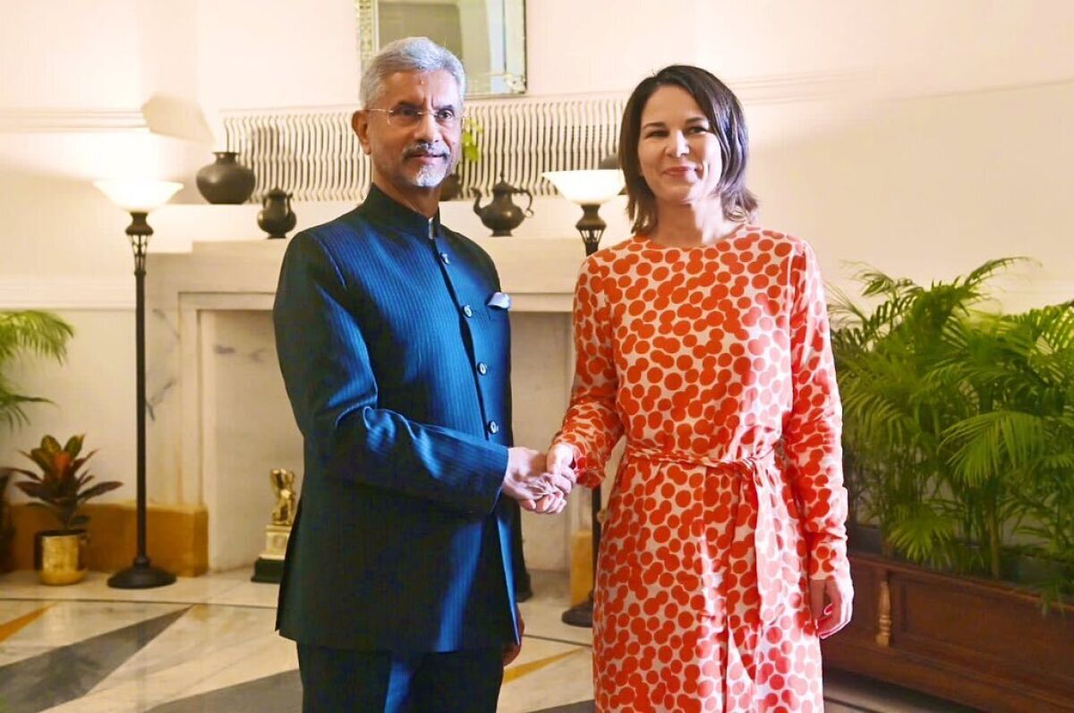 In this photo provided by Indian Foreign Minister S. Jaishankar's Twitter handle, Jaishankar and German Foreign Minister Annalena Baerbock, pose for a photograph during their meeting in New Delhi, India, Monday, Dec.5, 2022. (Indian Foreign Minister S. Jaishankar's Twitter handle via AP)