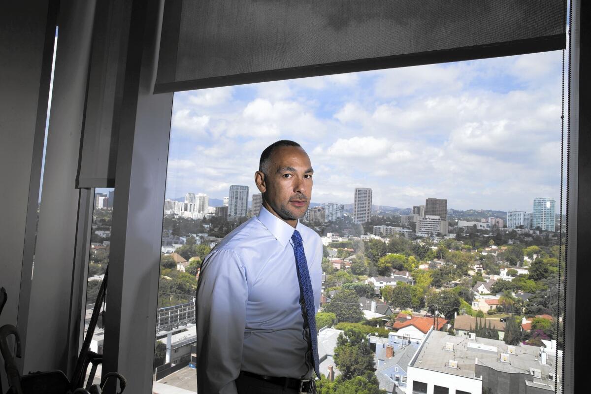 Matt Johnson, an entertainment lawyer, was elected president of the Los Angeles Police Commission. He hopes to improve police-community relations.