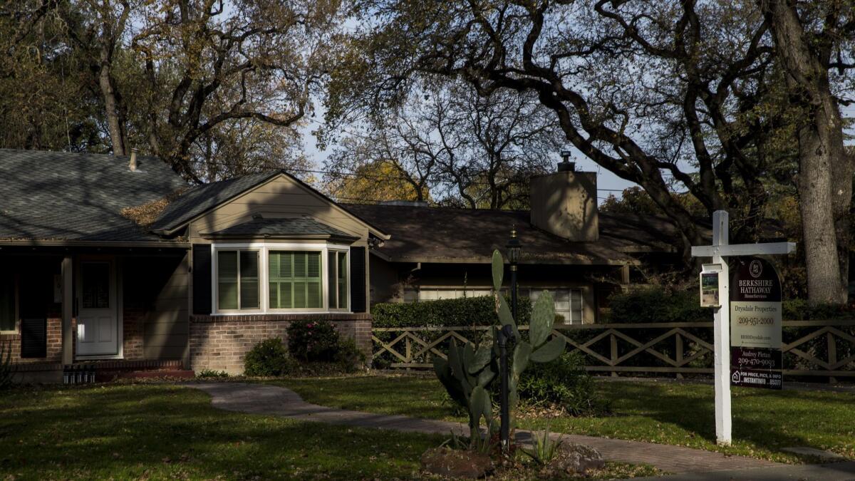 A home for sale in Stockton, Calif. Workers in Silicon Valley and the San Francisco-Oakland area, driven out of the cuckoo housing markets in those communities, have snapped up cheaper properties in Stockton, accepting the bargain of killer commutes.