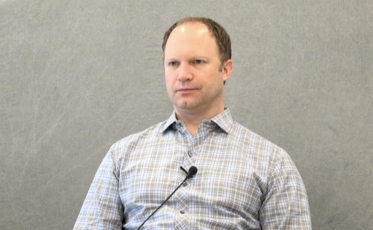 A man in a collared shirt