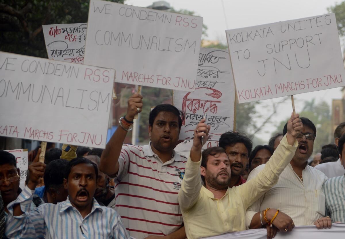 Indian Congress and leftist activists shout slogans against the ruling Bharatiya Janata Party government during a joint protest against the arrest of a student from Jawaharlal Nehru University in Kolkata on Feb. 15.