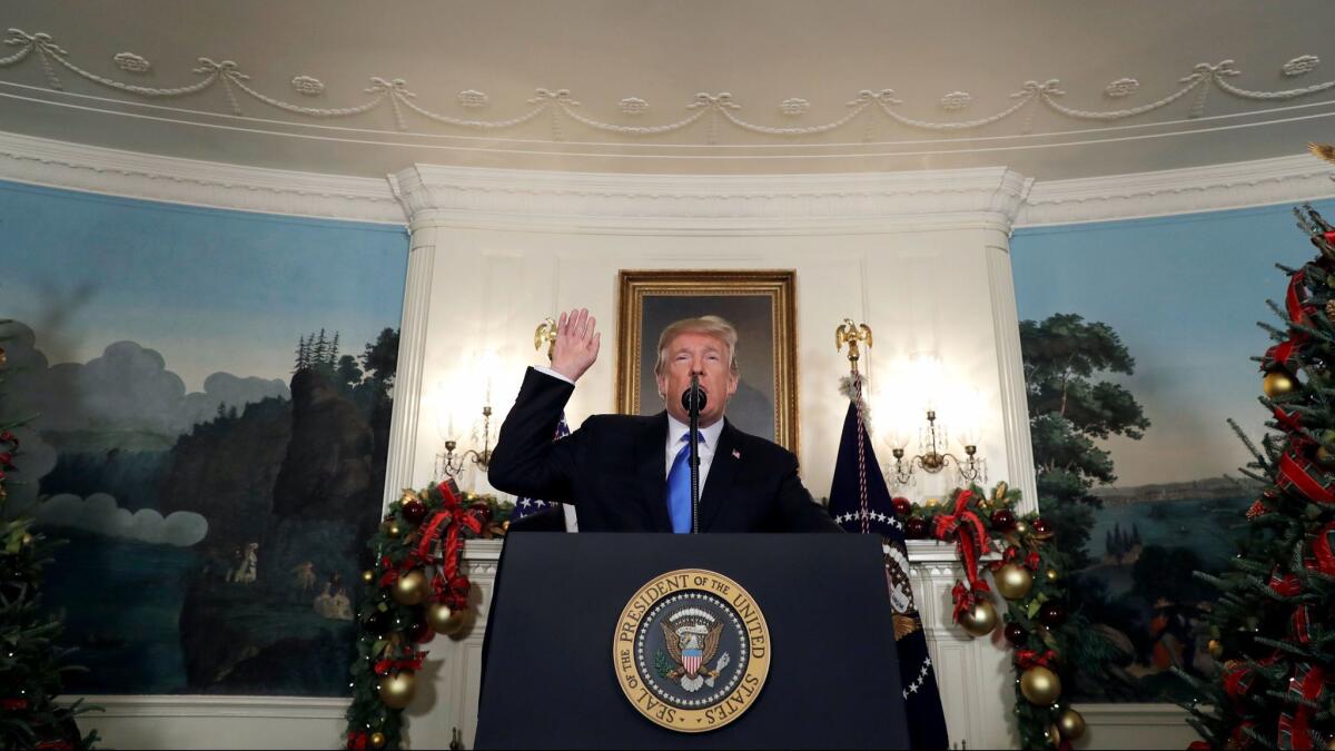 President Donald Trump speaks in the Diplomatic Reception Room of the White House in Washington on Dec. 6.