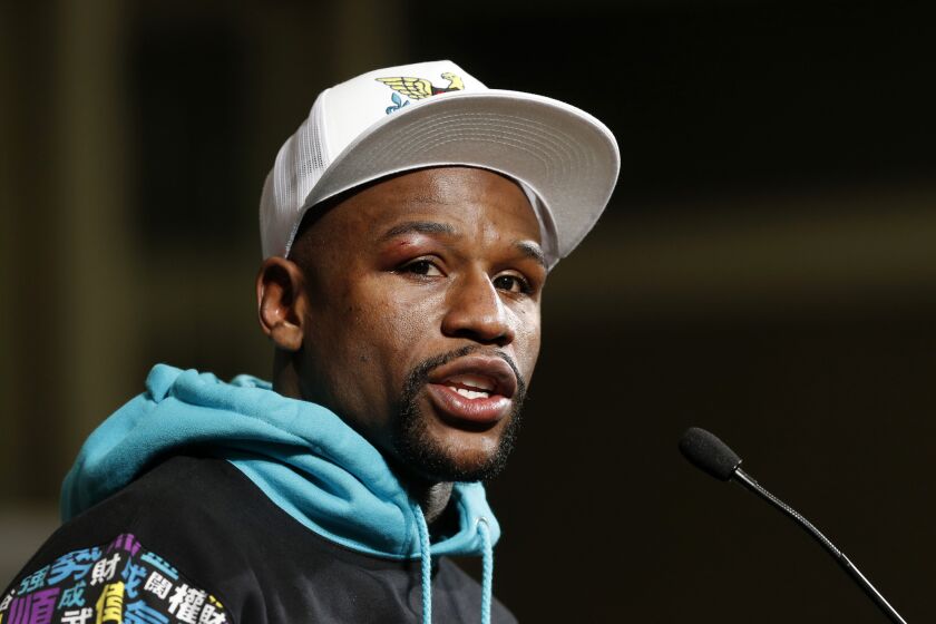 Floyd Mayweather Jr. speaks at a news conference after defeating Andre Berto on Sept. 12.