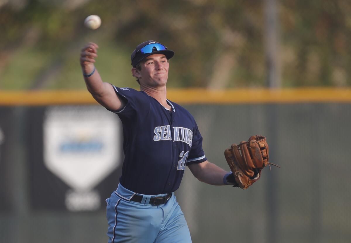 South All-Star Blake Butcher of Corona del Mar throws to first base during Tuesday's Orange County All-Star Baseball Game.