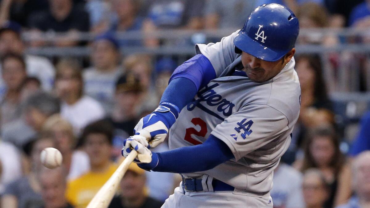 Dodgers first baseman Adrian Gonzalez singles in a run during the fourth inning of the Dodgers' 5-2 win over the Pittsburgh Pirates on Monday.