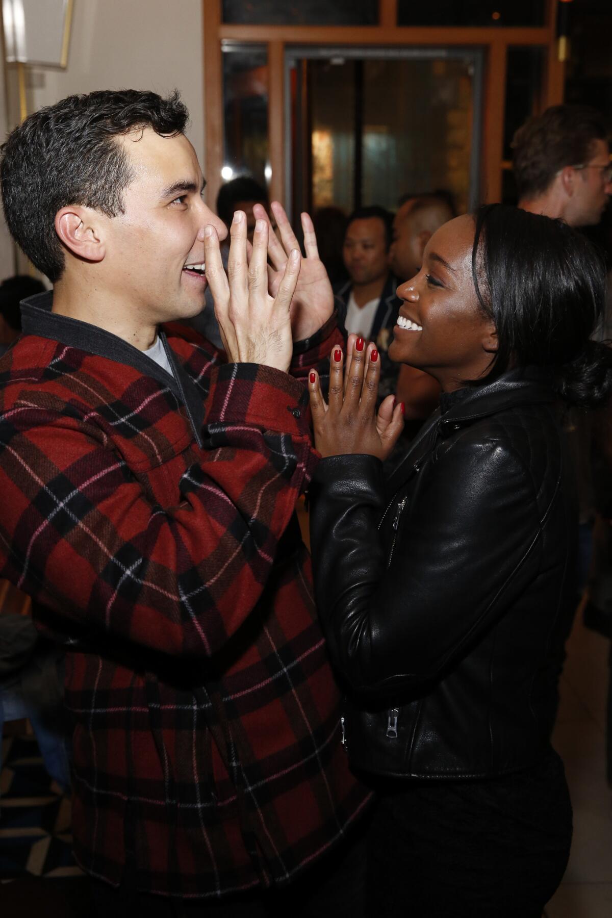 Conrad Ricamora and his "How to Get Away With Murder" costar Aja Naomi King at the after-party following the world premiere of "Soft Power."