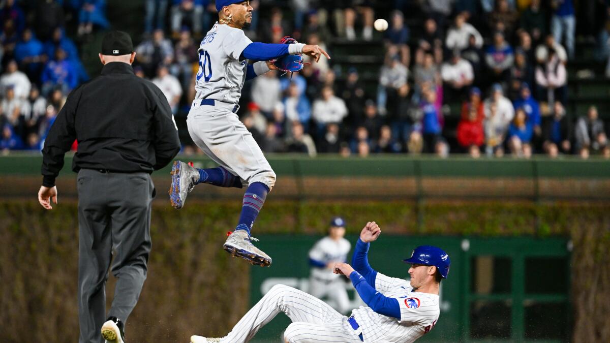 Mookie Betts has 2 of Dodgers' 3 hits, drives in 5 to beat Cubs - True Blue  LA