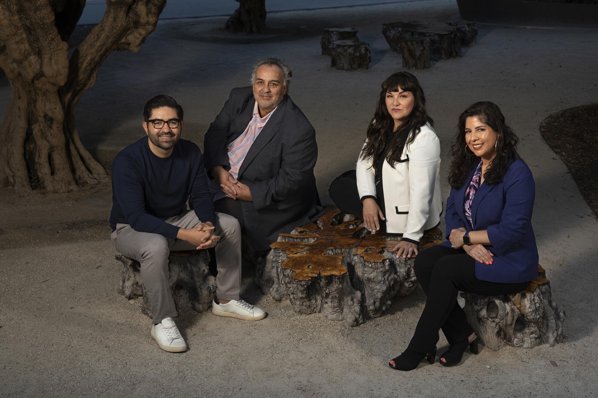 Jairo Alvarado, Luis Alfaro, Pilar Tompkins-Rivas and Ana-Christina Ramon sit amid an olive grove in downtown L.A.