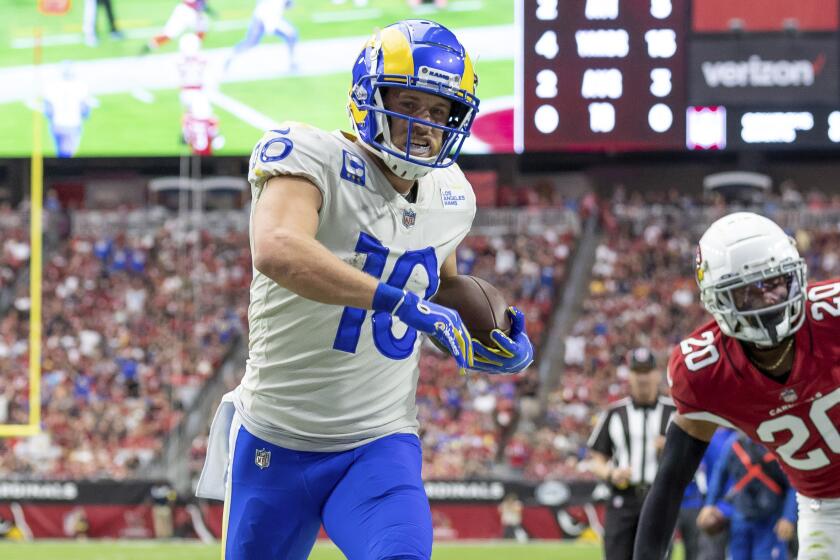 Wide receiver (10) Cooper Kupp of the Los Angeles Rams runs the ball for a touchdown.