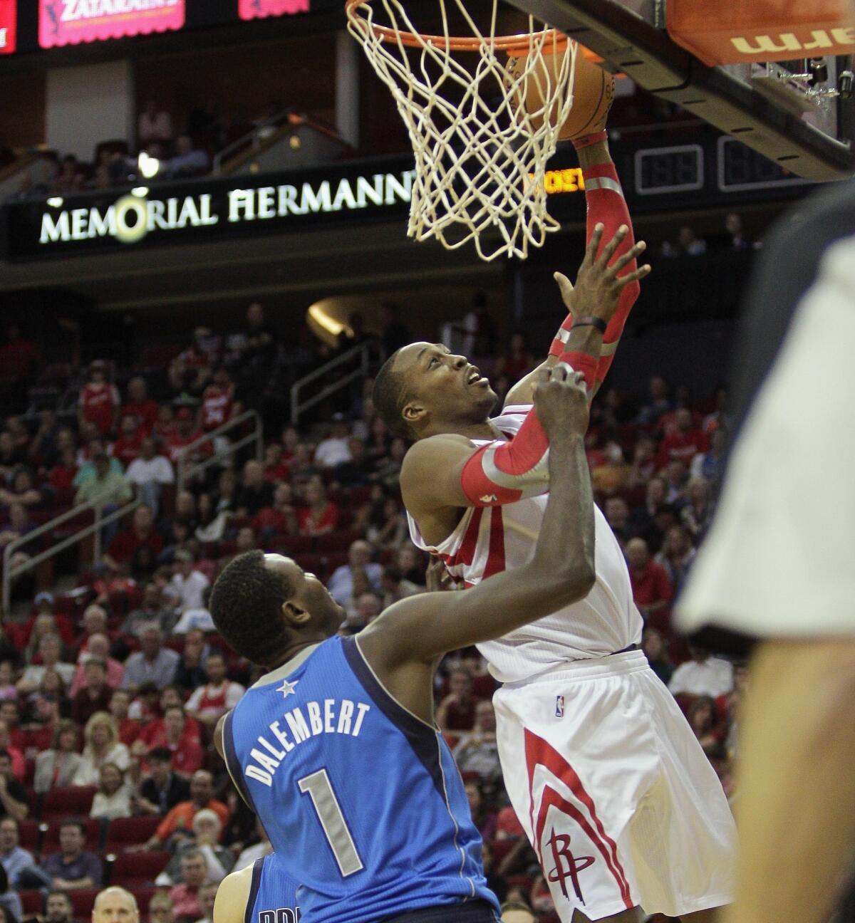 Former Lakers center Dwight Howard's unpopularity in Los Angeles has even spread to Clippers fans, who booed his appearance with his new team, the Houston Rockets.