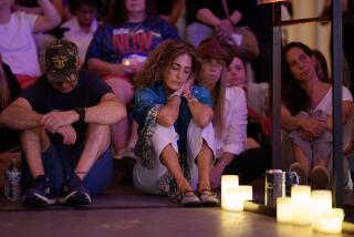 LOS ANGELES, CALIFORNIA - SEPTEMBER 1: People attend a vigil at the Nova Exhibition on September 1, 2024 in Los Angeles, California. The vigil was held to honor the six hostages who were taken October 7, 2023 and were killed by Hamas. The Los Angeles Nova Exhibition is an in-depth remembrance of the massacre at The Nova Music Festival on October 7th. (Photo by Eric Thayer/For The Los Angeles Times)