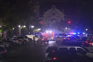 This image provided by WBMA shows police and emergency vehicles in the entertainment district after a shooting in Birmingham, Ala., Sunday, Sept. 22, 2024. (Bill Castle/WBMA via AP)