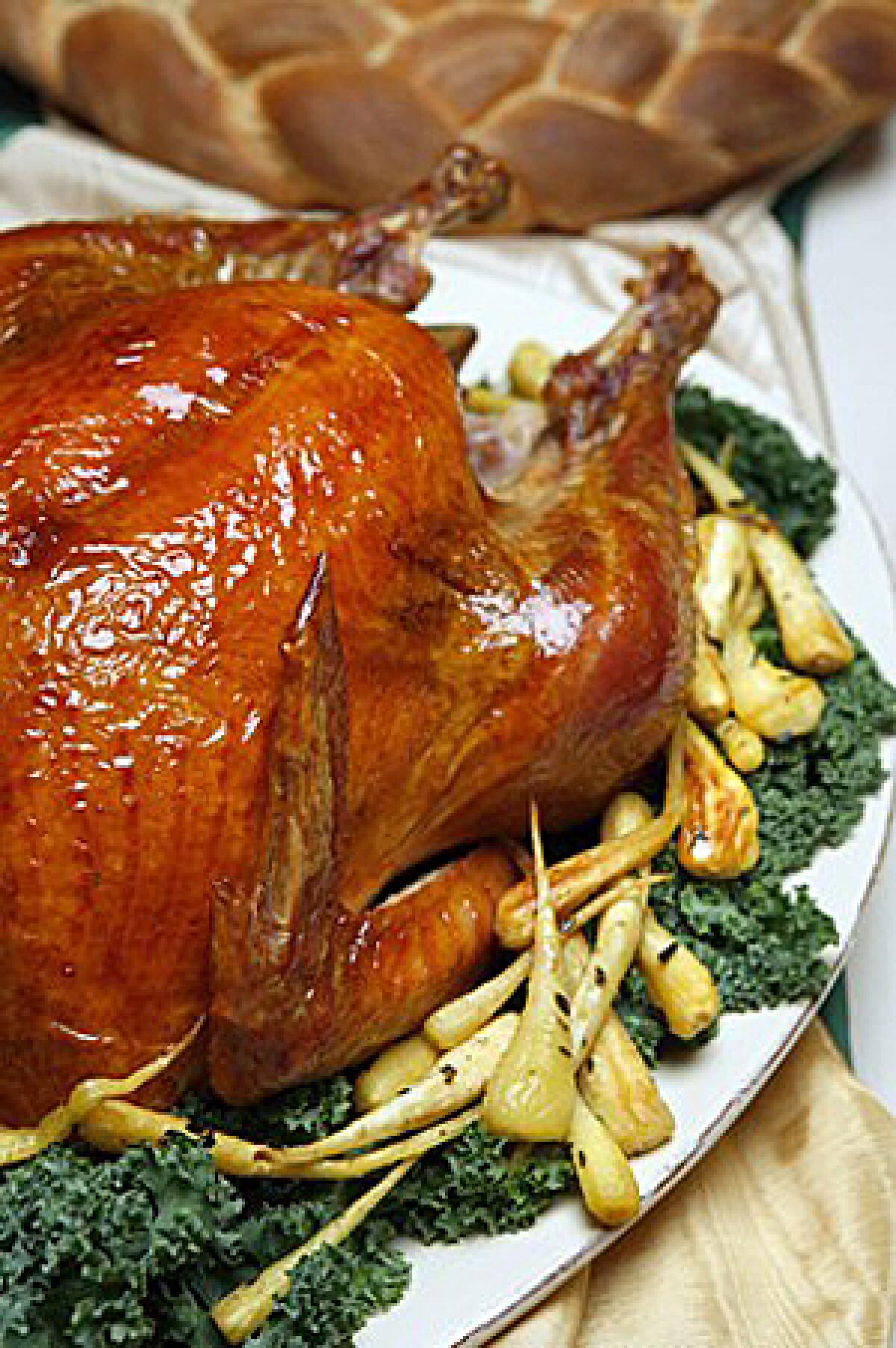 Roasted baby parsnips help set off the roasted turkey.