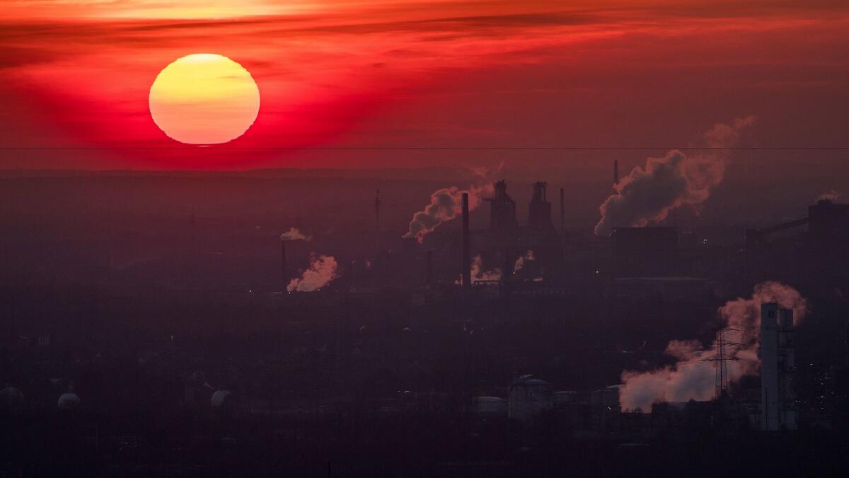 Steam and exhaust rise from different companies on a cold winter day in Oberhausen, Germany. Data from various agencies show 2016 was the hottest year on record.