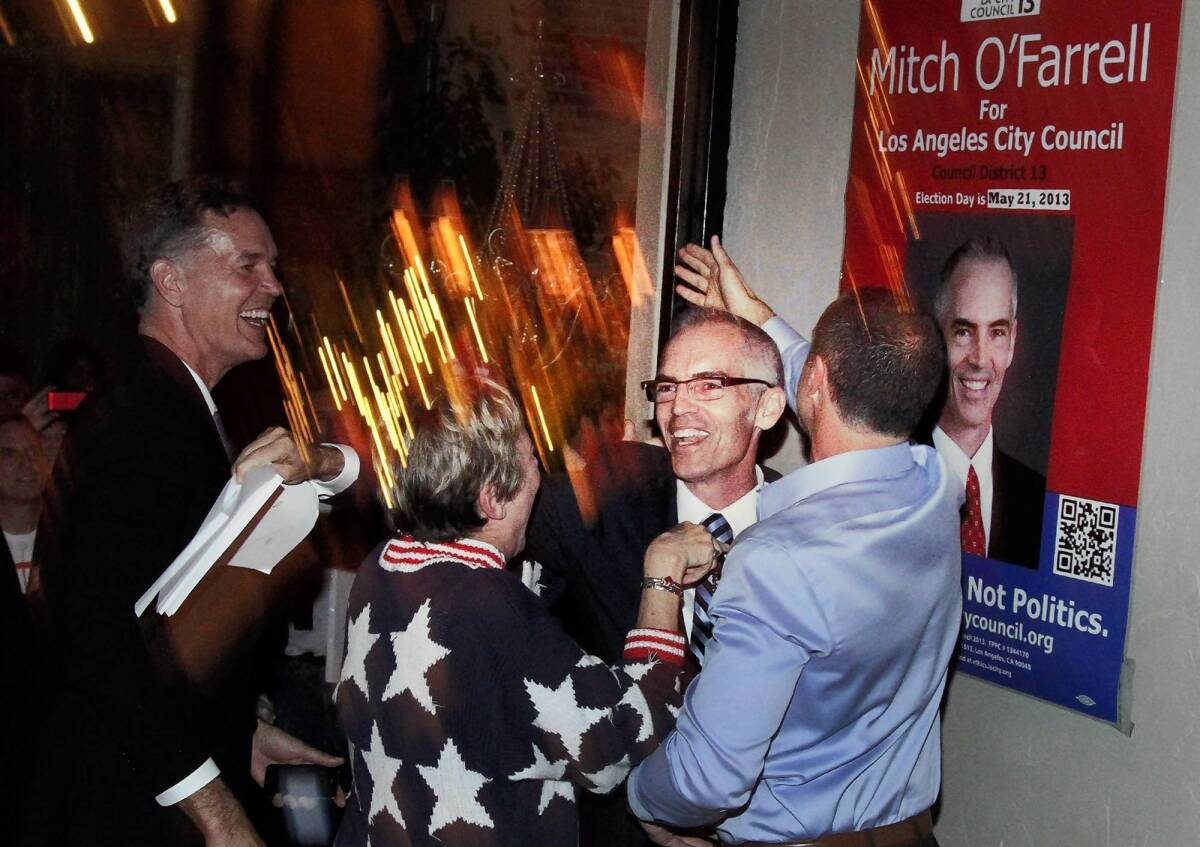Mitch O'Farrell, who defeated John Choi for the 13th Council District seat, celebrates his victory at his election night party. The seat had been held by Eric Garcetti, who was elected L.A. mayor.