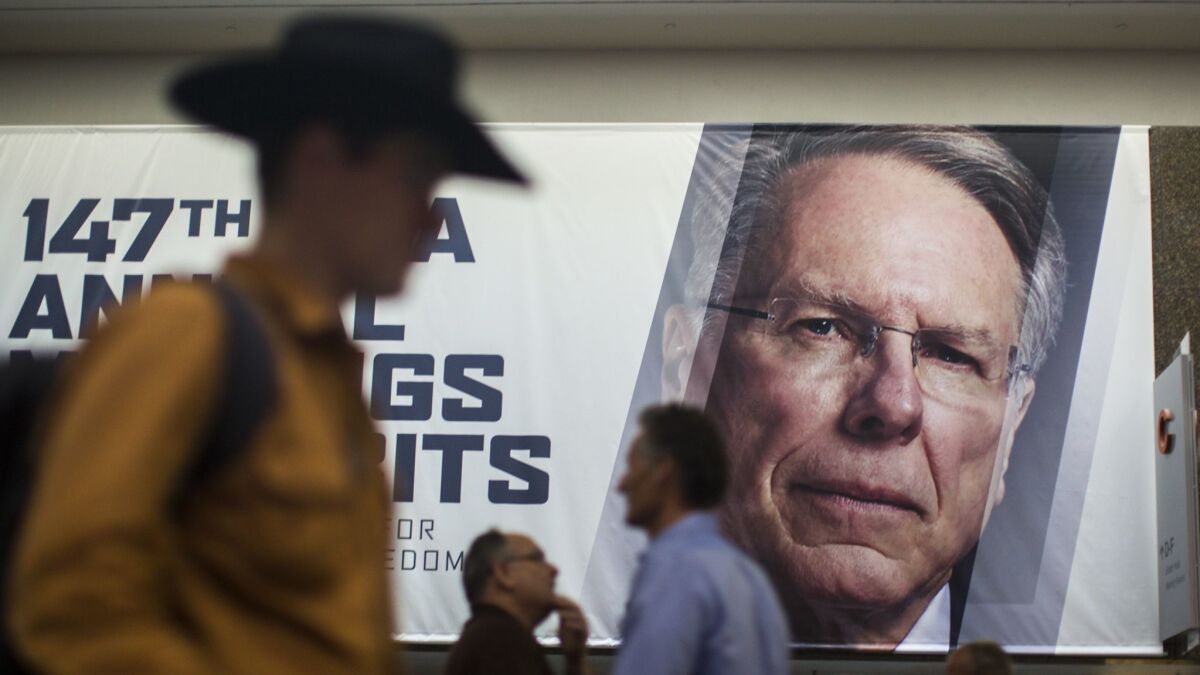 A poster with the face of Wayne LaPierre, chief executive of the NRA, inside the 2018 NRA Annual Meetings & Exhibits in Dallas, Tex. on May 3, 2018.
