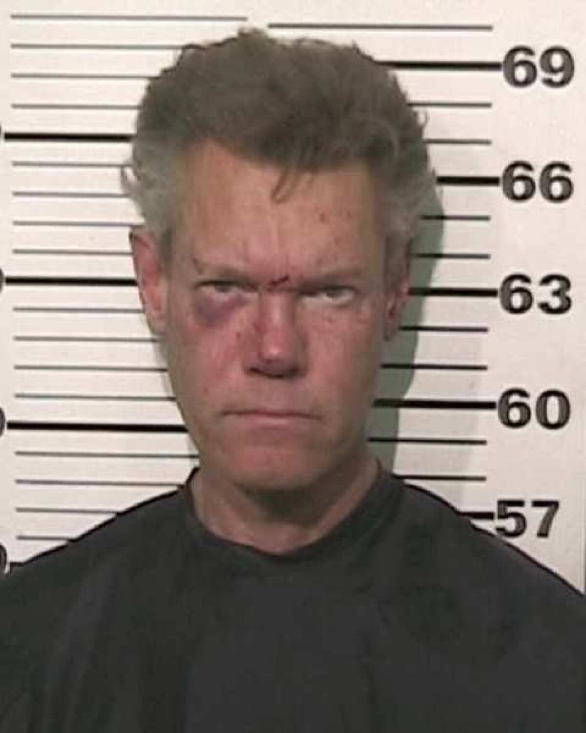 Randy Travis, in his booking photo after his drunk-driving arrest last week in Texas.