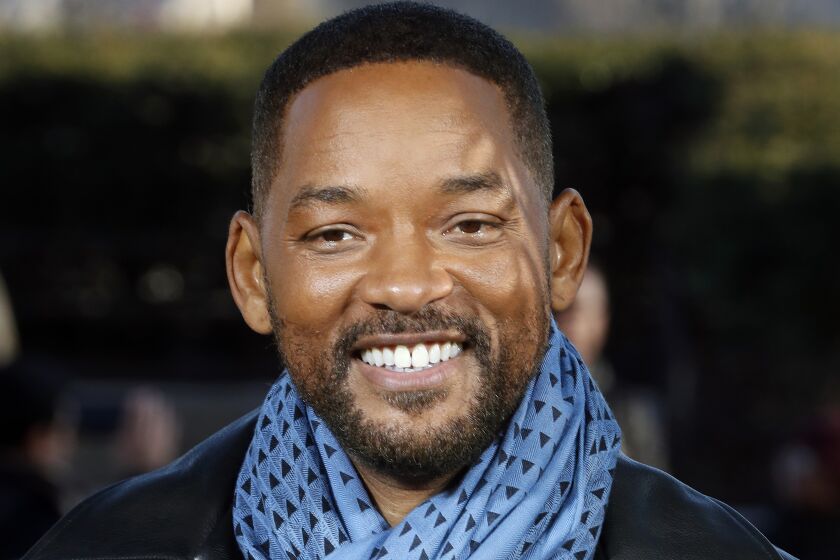 Will Smith smiles during a January 2020 photo call for "Bad Boys for Life."