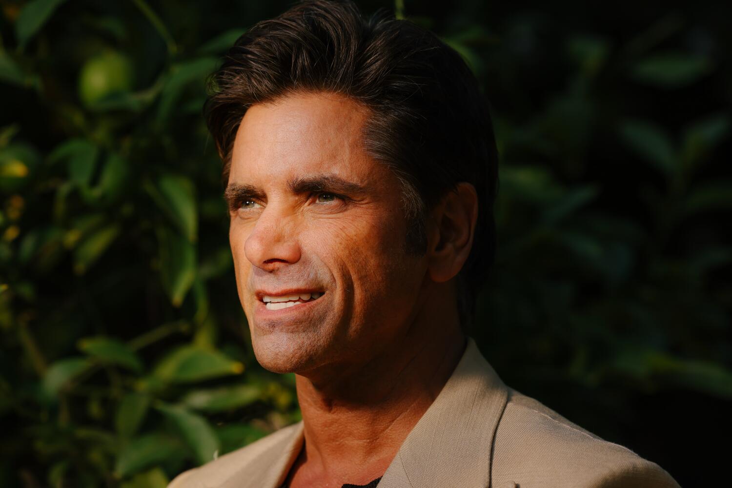 Over a Greek dish, John Stamos reflects on how his parents, grief and sobriety shaped his memoir