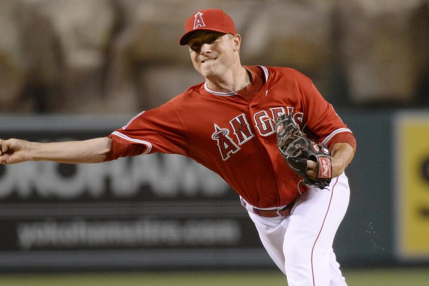 Angels closer Joe Smith throws during Saturday's win over the visiting Texas Rangers. Smith had a rough night in the bullpen Monday.